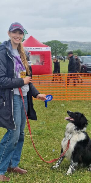 Proud winner with their rosette!