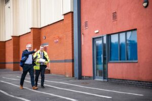 School estates professionals surveying site